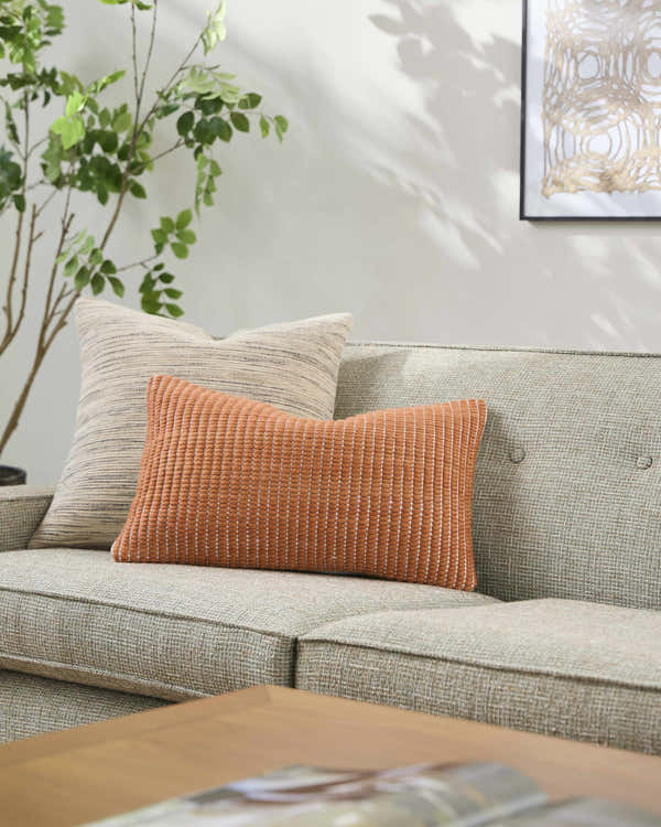 Trory Burnt Orange Throw Pillow