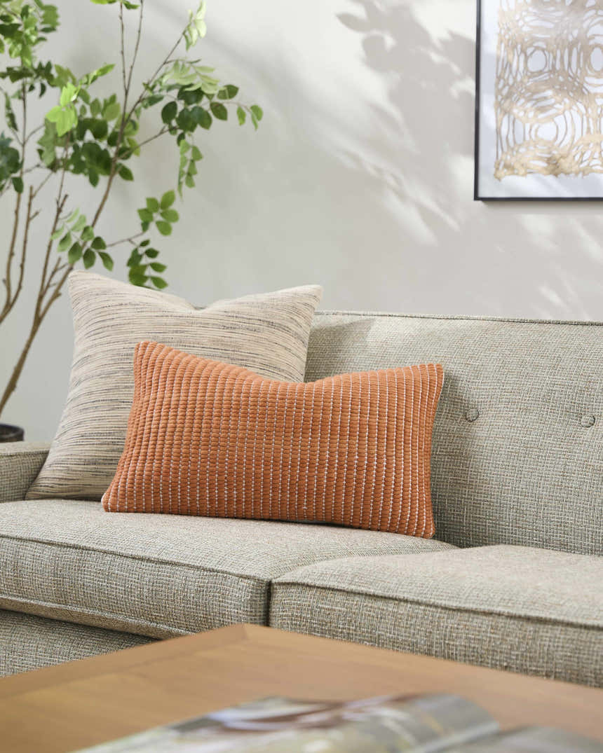 Trory Burnt Orange Throw Pillow