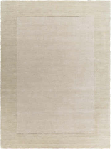 Close-up of a Bordered Solid Wheat Cream Wool Rug, showing the ivory and wheat tones and soft, hand-loomed texture. Design-Rectangle-811