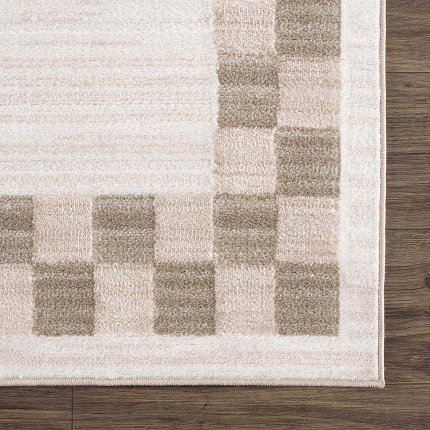 Close-up of the Azrika Beige Checkered Washable Rug showing the geometric pattern and soft beige, brown tones. Corner