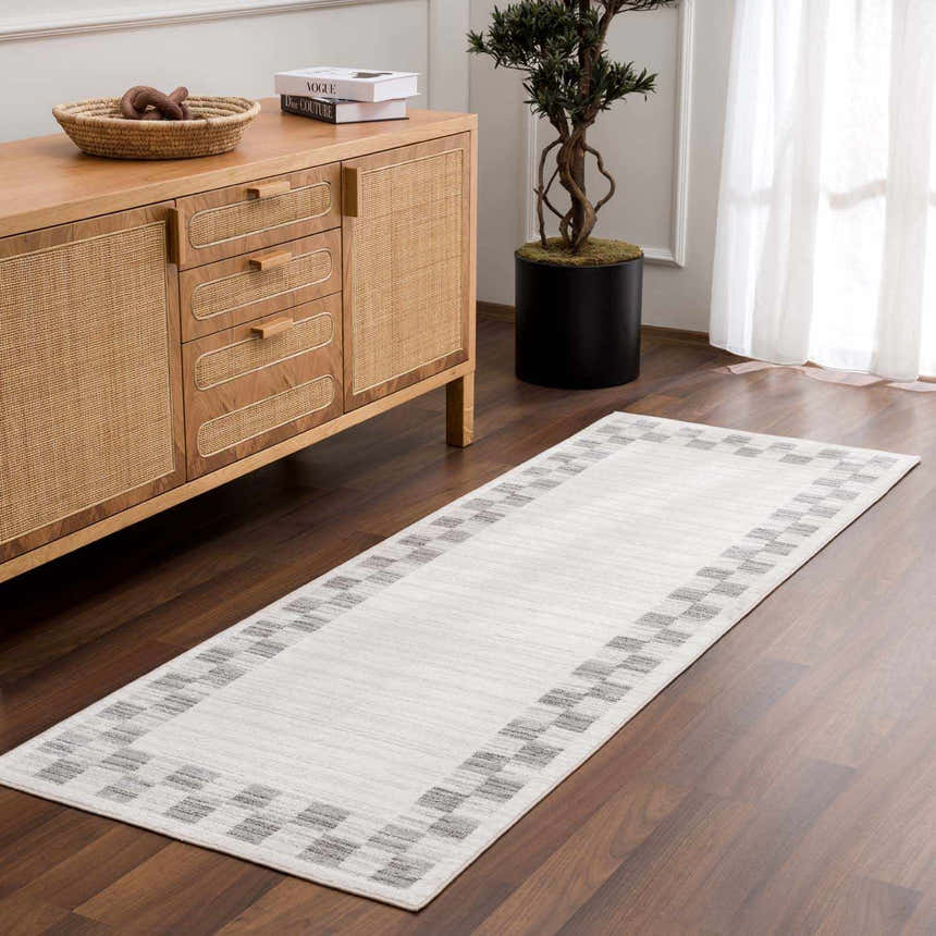 Entryway with Azrika Gray Checkered Washable Rug. Beige runner rug with geometric pattern on wood floor, light and airy space. Roomscene-Runner
