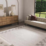 Living room with beige sofa and Azrika Gray Checkered Washable Rug. The rug has a subtle geometric pattern. Roomscene-Rectangle