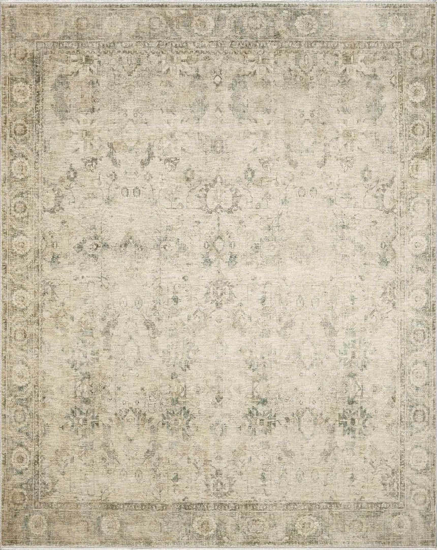 Close-up of the Fetscher II Vintage Medallion Area Rug. Beige rug with light brown, olive, and peach traditional medallion pattern. Design-Rectangle