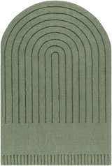 Close-up of the hand-loomed Arnona Green Area Rug, featuring a contemporary arch and line design. 100% Wool. Design-Custom
