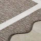Close up of the Varro Dark Brown Area Rug showing cream stripe and woven texture. Texture