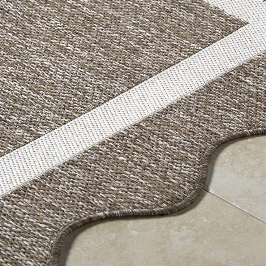Close up of the Varro Dark Brown Area Rug showing cream stripe and woven texture. Texture