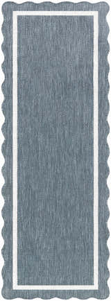 Close-up of the Varro Blue Area Rug. Features a blue woven texture, cream border, and a scalloped edge. Design-Runner-2773