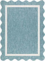 Close-up of the Varro Aqua Area Rug, showing the aqua color, cream border, woven texture, and scalloped edge. Design-Rectangle-537