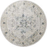 Close-up of the round Whangamata Thick Luxe Boutique Rug. Features a traditional pattern in dusty sage, light gray, and teal. Design-Round-67