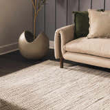 Living room scene with a cream sofa and the cream and black Williford Wool Area Rug. Roomscene-Rectangle