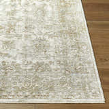 Close up of the Arella Area Rug in ivory, sandstone, slate gray, and taupe on hardwood flooring. Front