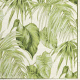 Close up of the Amirah Green Area Rug featuring an ivory base with a leafy olive pattern. Corner