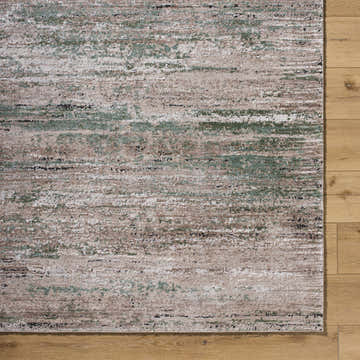 Close-up of the Zafer Luxe Thick Area Rug showing ivory, tan, sage, and black horizontal striations on a wood floor. Swatch