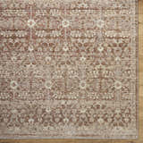 Close-up of the Ammiel Tan Area Rug. Traditional floral pattern in burnt orange, cream, dark red, gray, and tan. Corner