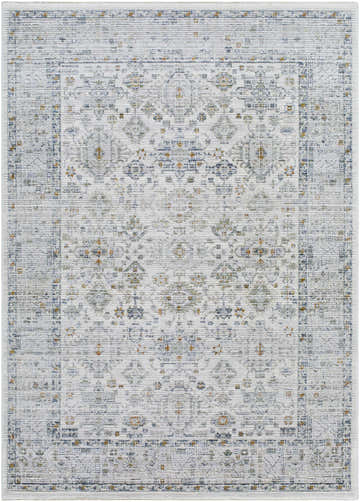 Close-up of the Aleron Area Rug. Machine-woven rug with traditional floral pattern in charcoal, light gray, navy, and medium gray. Design-Rectangle-679