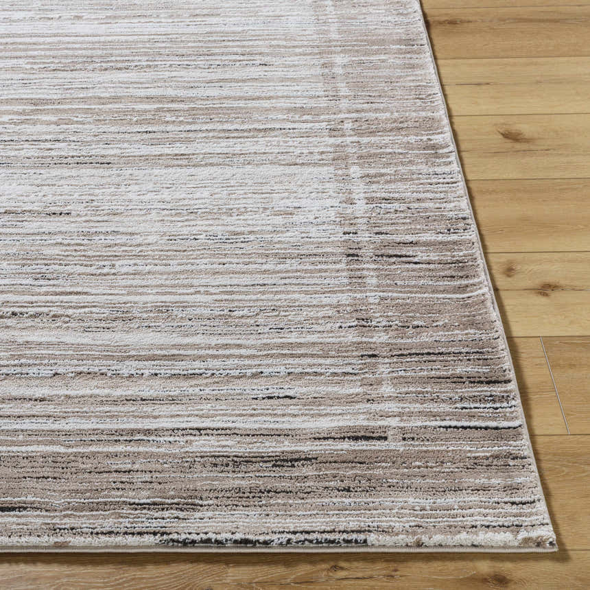 Close-up of the Ainhoa Luxe Thick Area Rug. Contemporary style with ivory, tan, and black horizontal stripes. Front