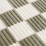 Close-up of the Kaysar Olive Green Checkered Washable Area Rug, showing its textured green and off-white checkered pattern. Texture
