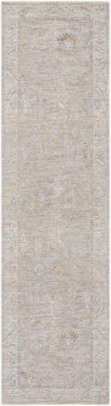 Close-up of the Ashra Thick Luxe Area Rug. Neutral colors, traditional pattern, and subtle border design. Soft texture. Design-Runner