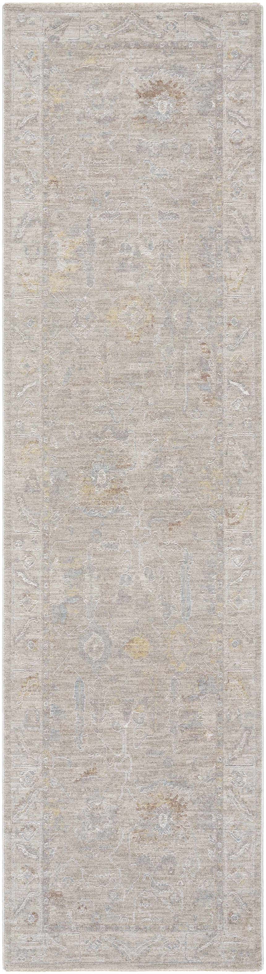 Close-up of the Ashra Thick Luxe Area Rug. Neutral colors, traditional pattern, and subtle border design. Soft texture. Design-Runner