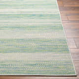 Close-up of Kris Green Area Rug showing texture and horizontal stripes of moss, natural gray, and dark beige. Front