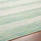 Close-up of Kris Green Area Rug showing texture and horizontal stripes in moss, natural gray, and dark beige. Texture