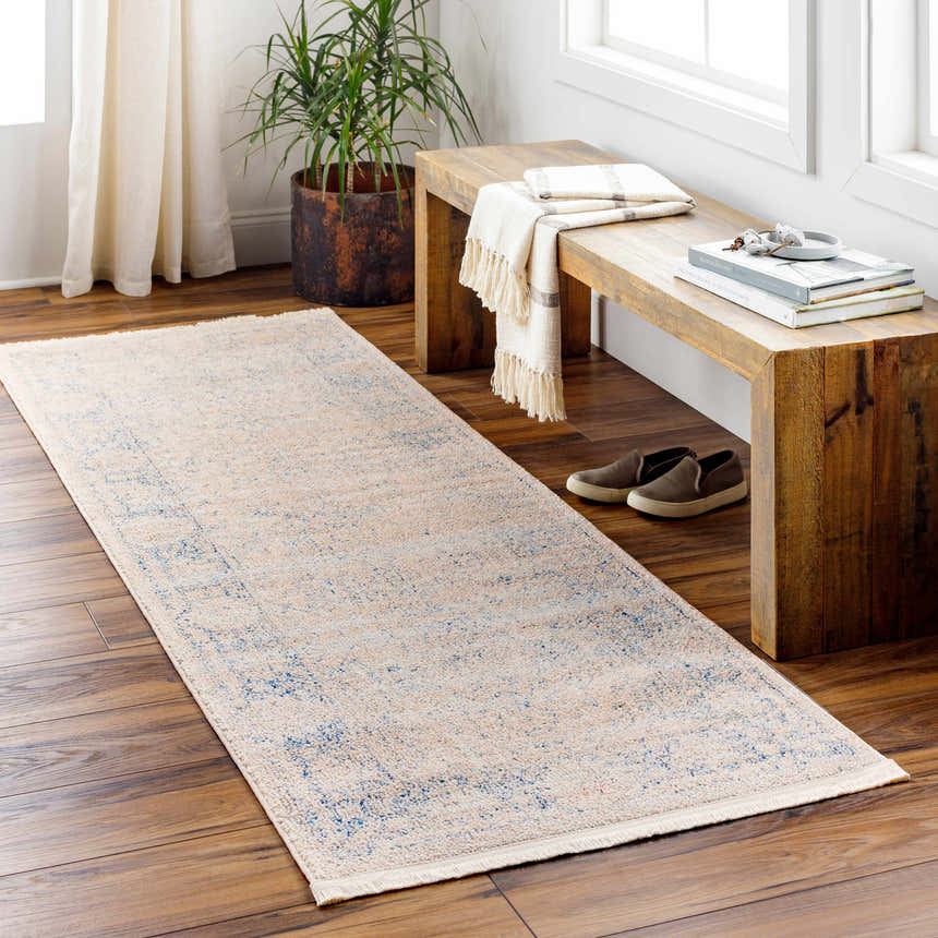 Entryway scene with Dian Area Rug runner in dark blue and ivory, wooden bench, and potted plant. Roomscene-Runner