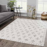 Living room scene with gray sofa and Tigris Swiss Cross Ivory&Gray Area Rug with geometric pattern. Roomscene-Rectangle