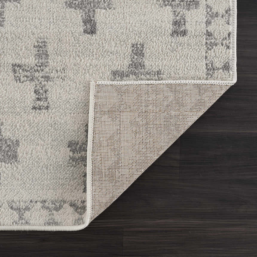 Close-up of the Tigris Swiss Cross Ivory&Gray Area Rug showing the geometric pattern, soft texture, and rug backing. Fold