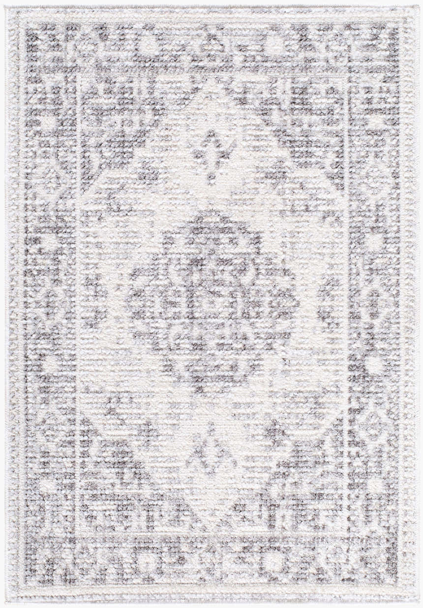 Close-up of the Odeon Machine Woven Elle Decor x LIVABLISS EDOD-2305 Area Rug. Features charcoal, cream, and gray contemporary design. Design-Rectangle-221