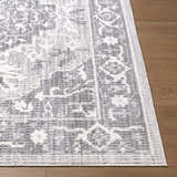 Close-up of the Odeon Elle Decor x LIVABLISS EDOD-2305 Area Rug showing its charcoal, cream, and gray contemporary pattern. Front