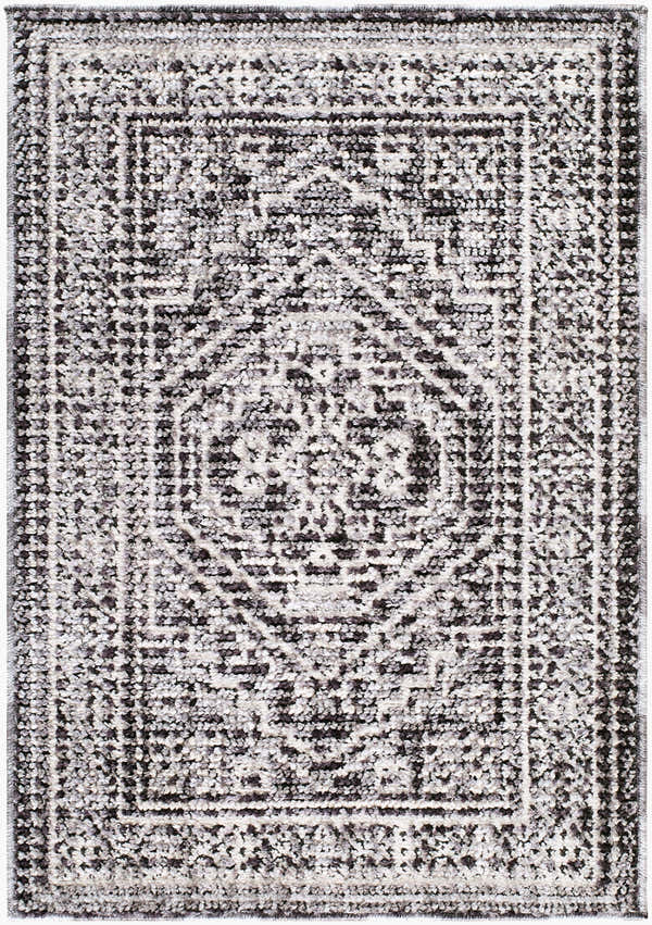 Close-up of the Odeon Elle Decor x LIVABLISS EDOD-2306 Area Rug. Features a contemporary black, charcoal, and cream geometric pattern. Design-Rectangle-221