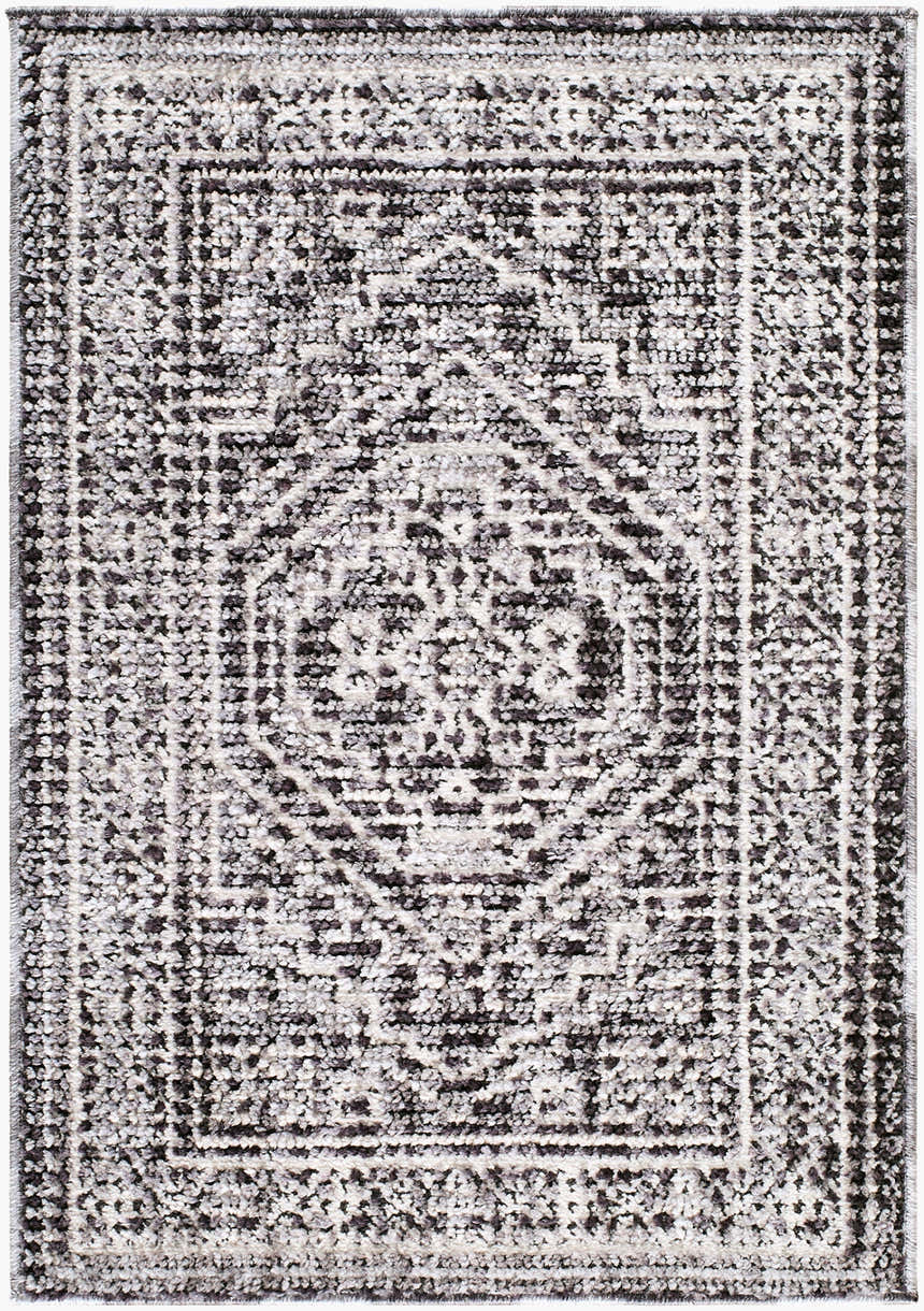 Close-up of the Odeon Elle Decor x LIVABLISS EDOD-2306 Area Rug. Features a contemporary black, charcoal, and cream geometric pattern. Design-Rectangle-221