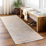 Entryway scene with a Tusa Blue Area Rug runner, wood bench, plant, and natural light. Roomscene-Runner