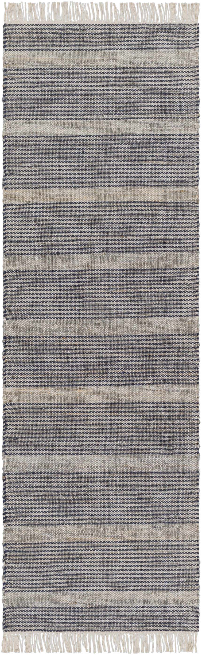 Close-up of the hand-woven Gambalidio Area Rug. Navy and off-white horizontal stripes with jute texture and fringed edges. Design-Runner-268
