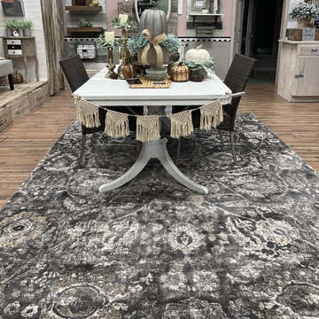 Farmhouse dining room with a Georgiana Charcoal Area Rug under a white table with fall decor. Roomscene-Rectangle