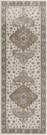 Close-up of the Southwark Area Rug. Beige rug with black, charcoal, and mustard geometric, vintage-style pattern. Design-Runner-2773