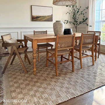 Farmhouse dining room with a wooden table and the beige Ionut Checkered Jute Area Rug. Roomscene-Rectangle
