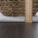 Close-up of the pile height of the Fremantle Gray Marble Rug, showing its construction and texture. Pile