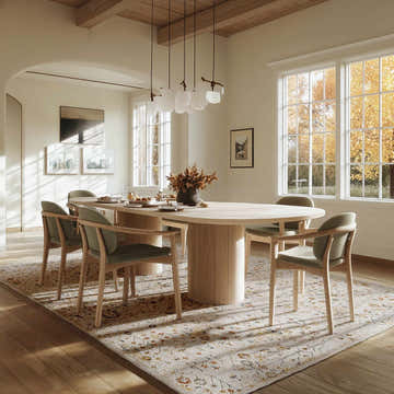 Dining room with an oval table and the Kabungahan Oushak Style Floral Rug in brick red, cream, and light brown. Roomscene-Rectangle