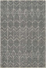 Close-up of the hand woven Kate Area Rug. Dark gray jute rug with a light gray geometric diamond pattern. Design-Rectangle-576