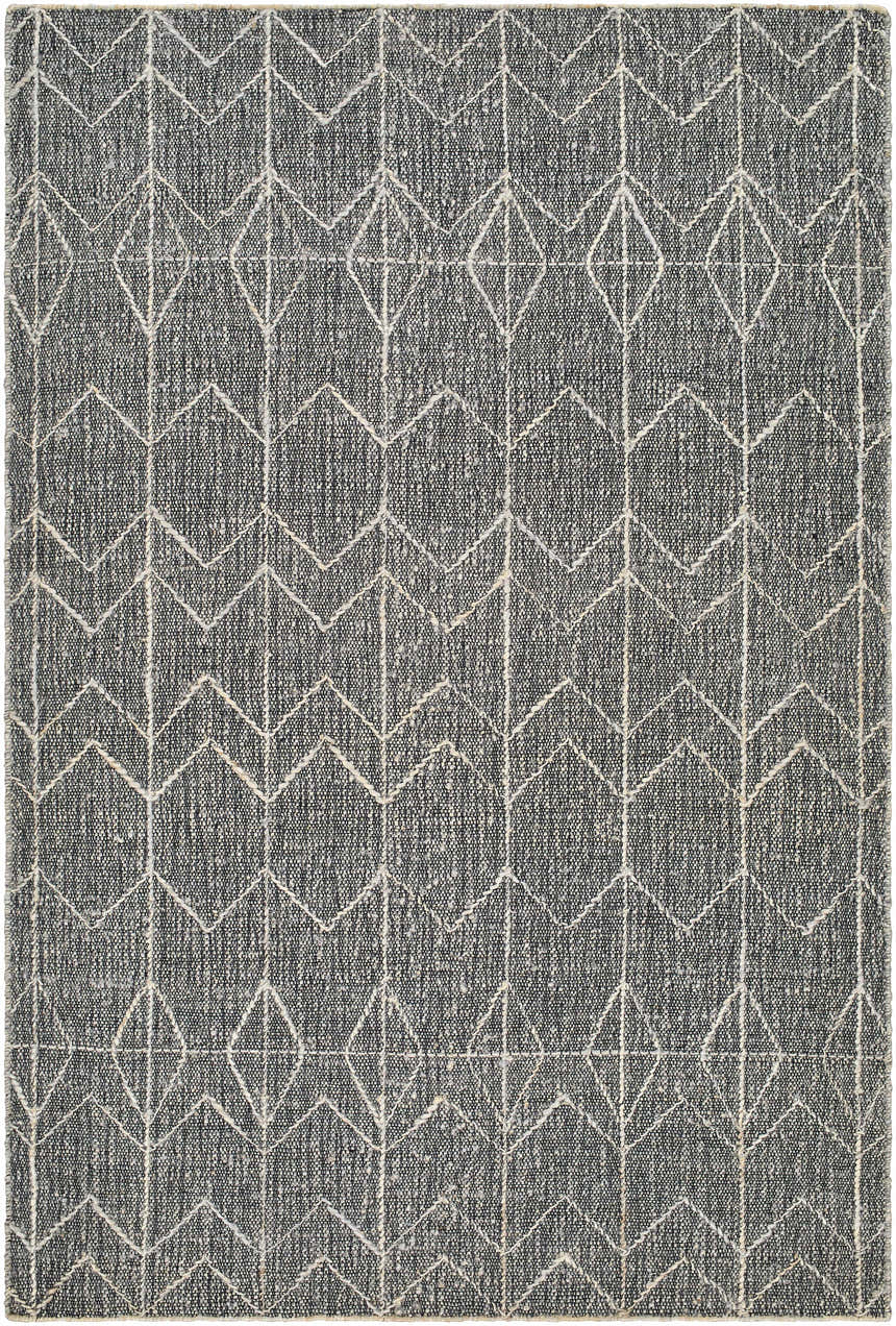 Close-up of the hand woven Kate Area Rug. Dark gray jute rug with a light gray geometric diamond pattern. Design-Rectangle-576