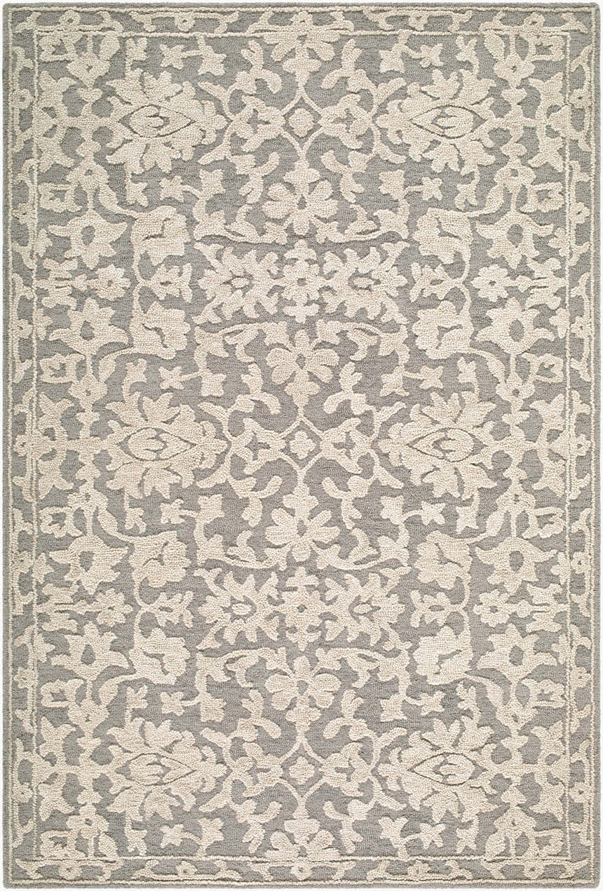 Close-up of the hand-tufted Kamran Homapu rug. Ivory floral pattern on a stone gray background. 100% wool traditional rug. Design-Rectangle-576