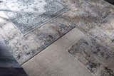 Close-up of Monto Luxe Rugs in charcoal, cream, gray, and taupe. Bohemian, traditional, and contemporary styles. Styleshot