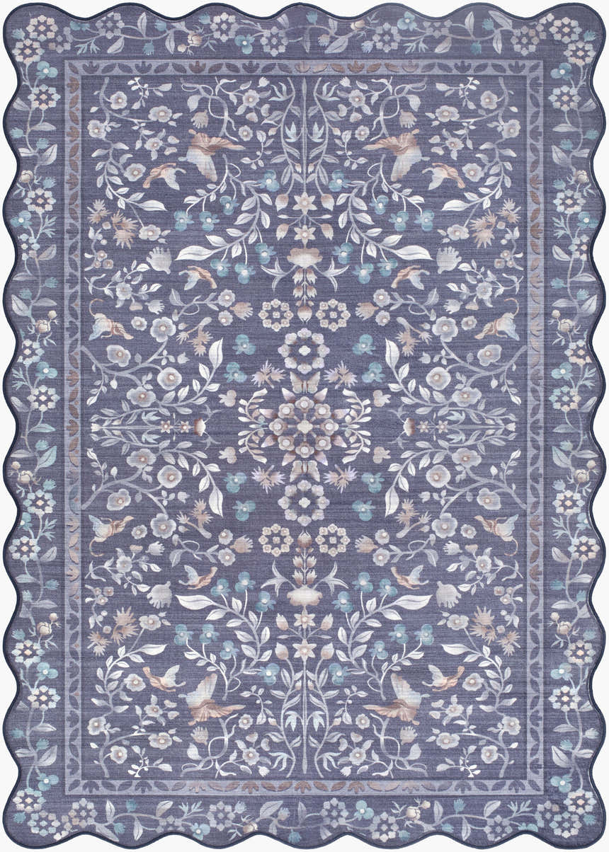 Close-up of the Dascha Washable Area Rug, a blue rug with ivory, gray, and taupe floral and bird pattern and scalloped edge. Design-Rectangle-2339