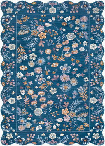 Close-up of the Harena Washable Area Rug. Denim blue rug with a floral pattern and a scalloped edge. Contemporary style. Design-Rectangle-576