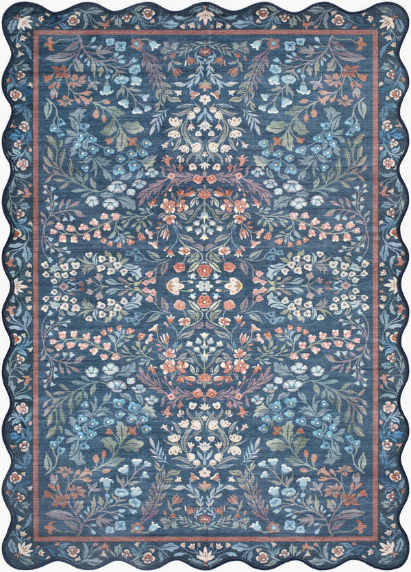 Close-up of the Pepo Blue Floralnature Rug, featuring a blue background and coral, ivory, and sage floral pattern. Scalloped edge. Design-Rectangle-576
