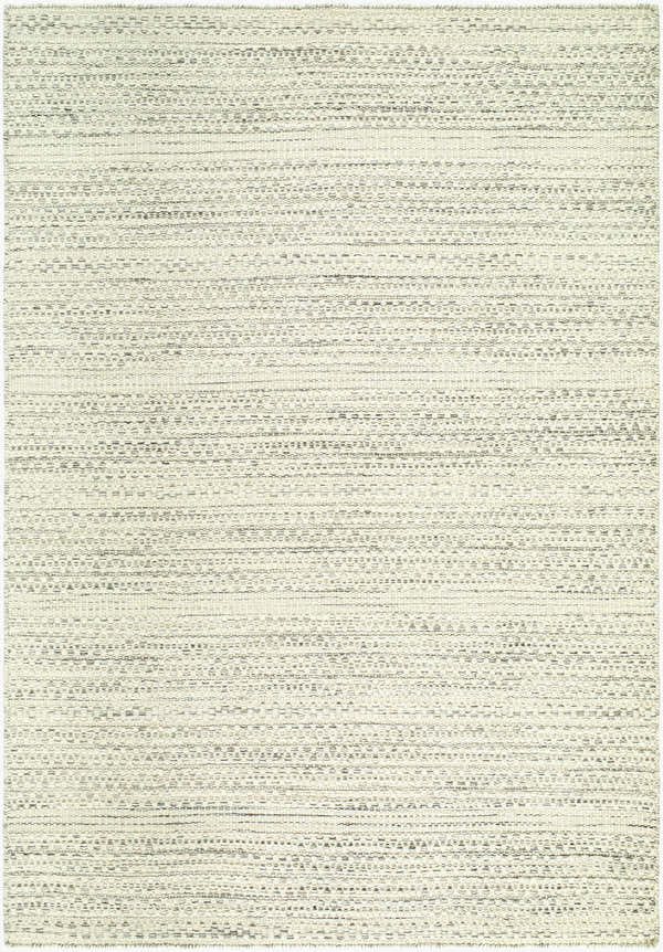 Close-up of the Jariah Area Rug. Hand-woven wool rug in charcoal, ivory, and light gray with a subtle horizontal pattern. Design-Rectangle-576