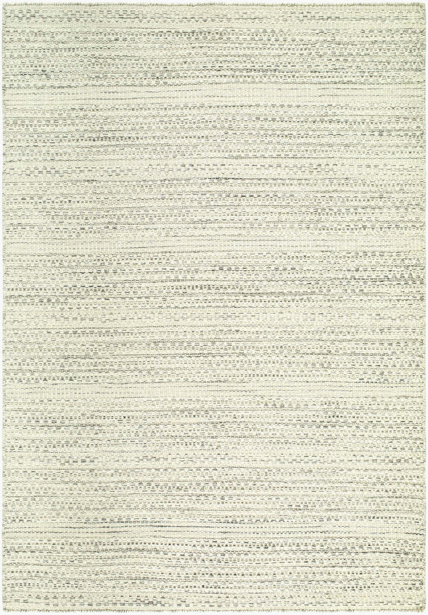 Close-up of the Jariah Area Rug. Hand-woven wool rug in charcoal, ivory, and light gray with a subtle horizontal pattern. Design-Rectangle-576