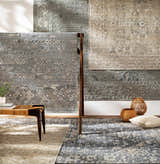 Galchutt Embossed Gray Viscose Wool Rug display. Hand loomed rugs in charcoal, gray, and light gray with embossed patterns. Styleshot