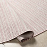 Close-up of the Greg Pink Area Rug showing the striped pattern and woven texture. Cloud Gray, Lambswool, and Multi Brown colors. Fold